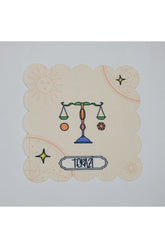 Digitally Printed Laser Cut Cocktail Napkin with Libra Zodiac Sign Design