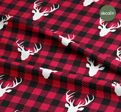 Digitally Printed Christmas Fabric with a White Deer Silhouette Pattern on a Red Black Gingham Background
