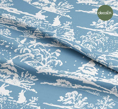 Digitally Printed Christmas Fabric with a White Silhouette Pattern on a New Year's Themed Blue Background